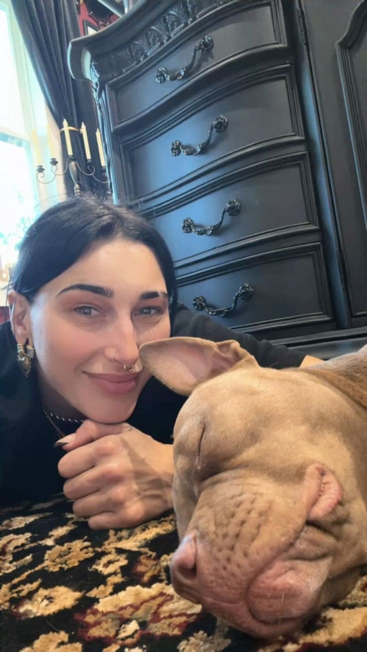 Rhea Ripley with Dog